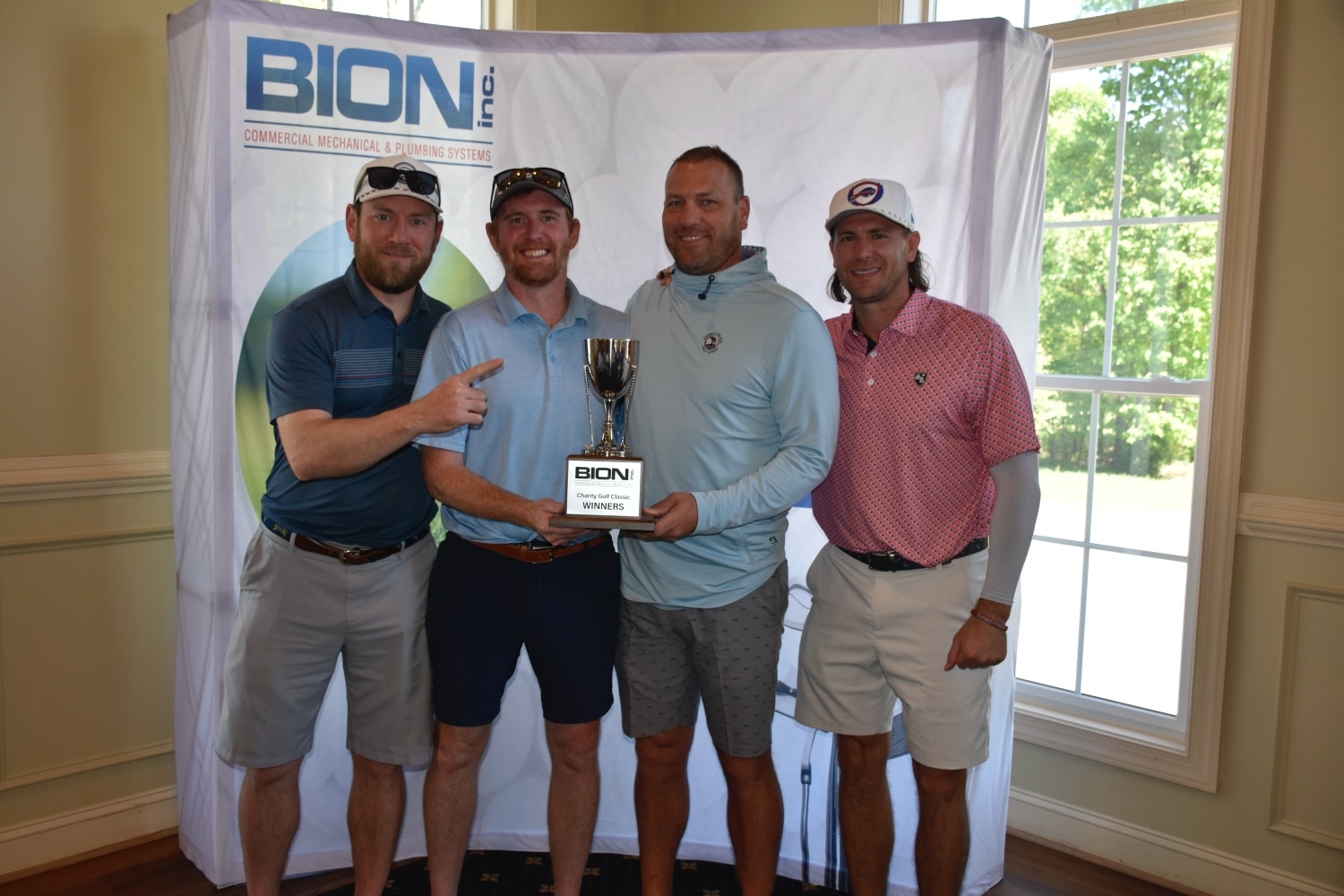 Golfer holding award