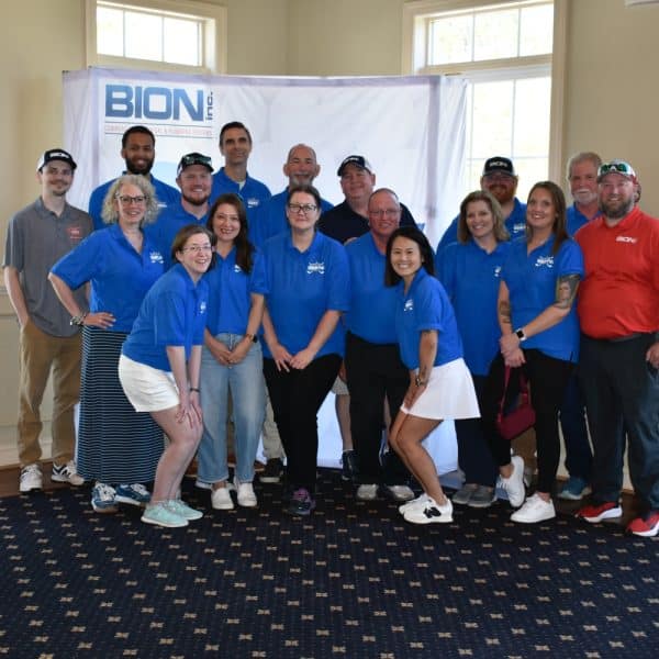 Group of people in blue shirts