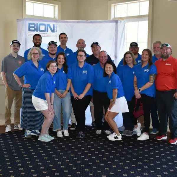 Group of people in blue shirts